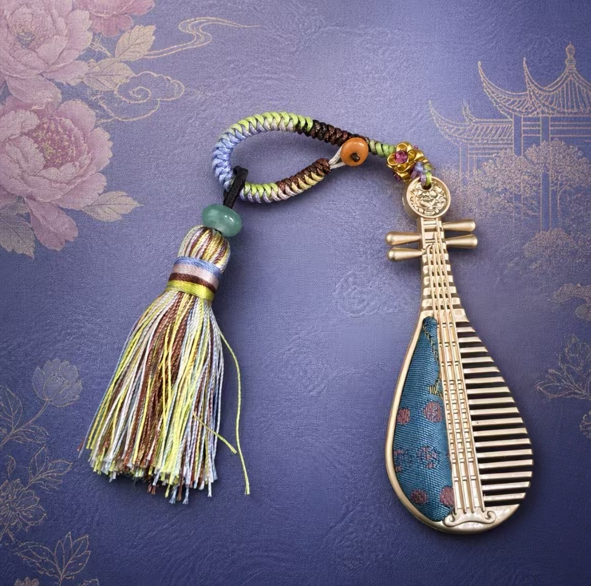 Dark‑blue pipa‑shaped tassel keychain, Chinese handicraft souvenir
